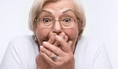 depositphotos_62108513-stock-photo-elderly-woman-closes-her-mouth